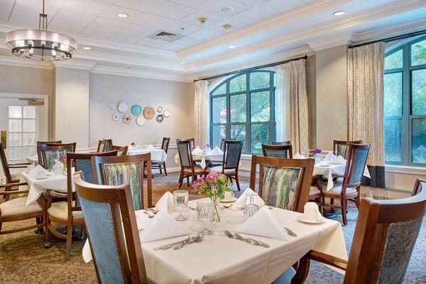 Dining room set for residents with decorated tables