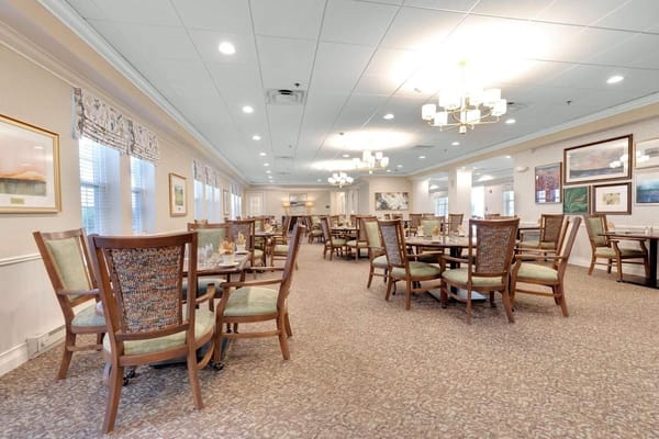 Dining area with tables and seating for residents