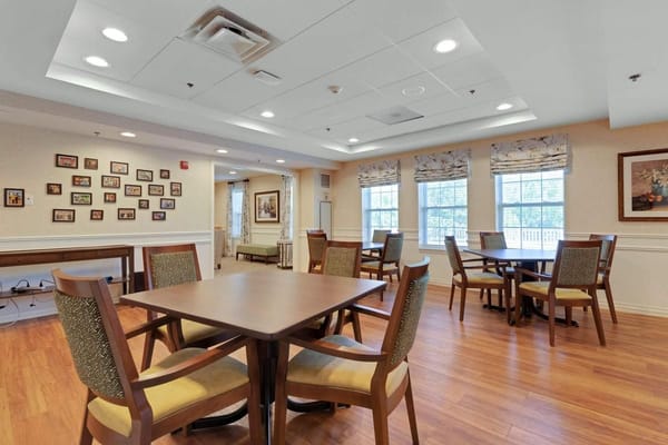 Bright common area with tables and chairs
