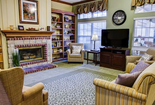 Cozy common area with seating and fireplace