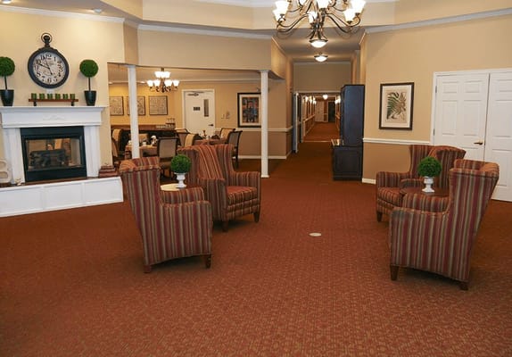 Cozy common area with seating and fireplace