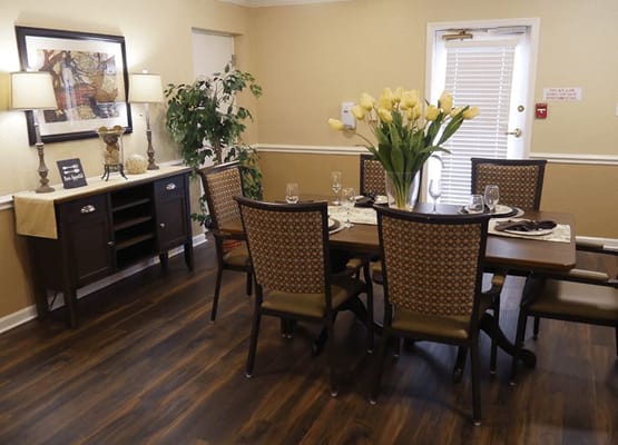Well-decorated dining room with a large table