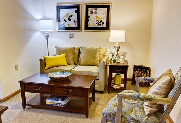 Cozy sitting area with comfortable furniture and decor