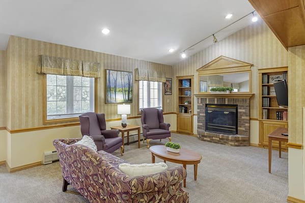 Cozy common area with seating and fireplace
