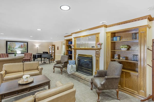 Common area with seating and a fireplace