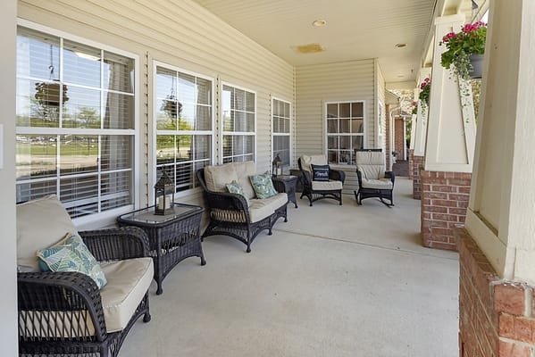 Outdoor seating area with comfortable chairs and tables