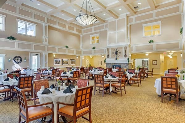 Bright dining area with neatly arranged tables and chairs