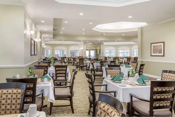 Dining room with tables set for a meal