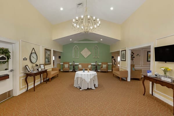 Bright interior common area with seating and decor