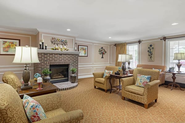 Cozy common area with seating and fireplace