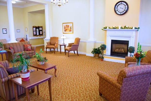 Cozy common area with comfortable seating and fireplace