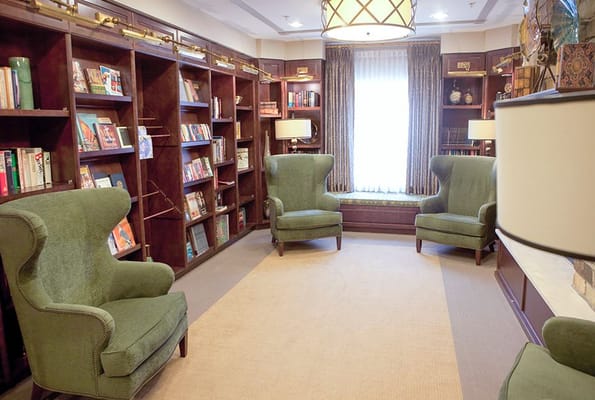 Cozy library with comfortable seating and bookshelves