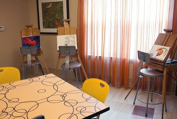 Art easels set up in an activity room