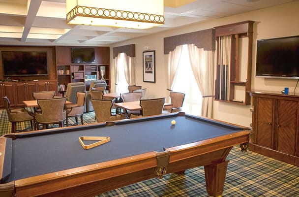 Interior view of a common area with a billiards table