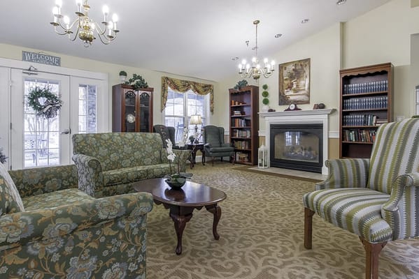 Cozy lounge area with comfortable seating and a fireplace