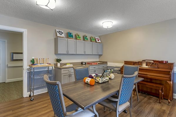 Interior view of a common area with tables and decor