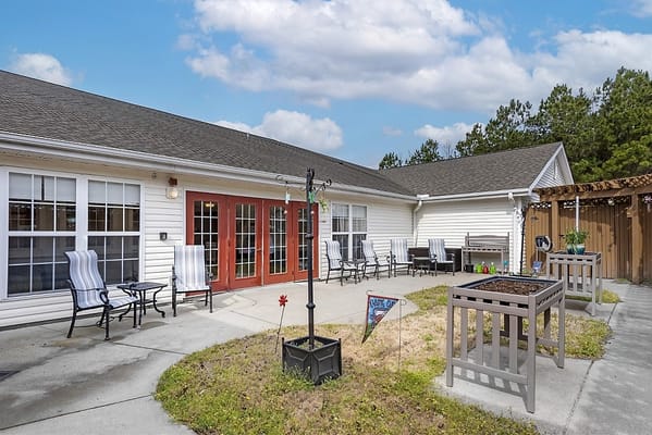 Outdoor patio area with seating and planters