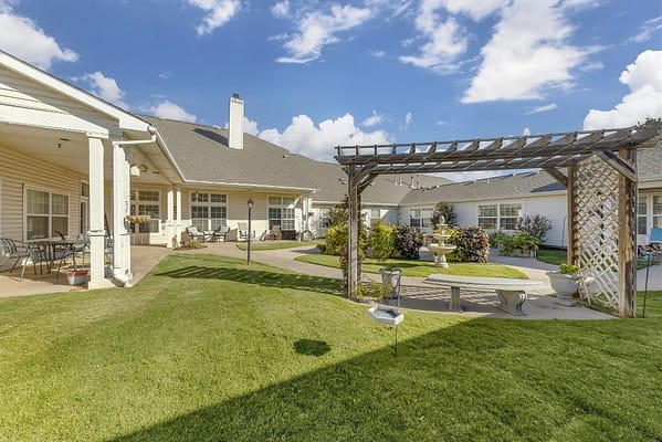 Outdoor garden area with seating and landscaping