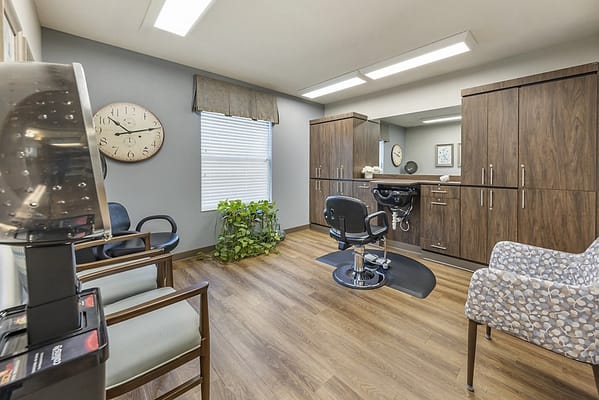 Interior view of a salon space with styling chairs