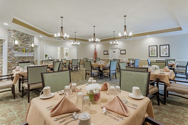Dining room setup with elegantly arranged tables