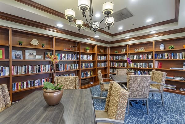 Cozy reading area with bookshelves and seating