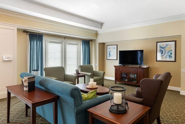 Common area with seating and television