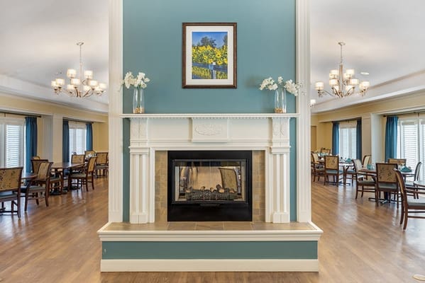 Common area with fireplace and dining space