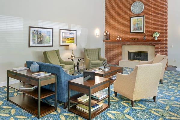 Bright common area with seating and decor