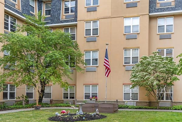 Exterior view of the nursing home with outdoor space