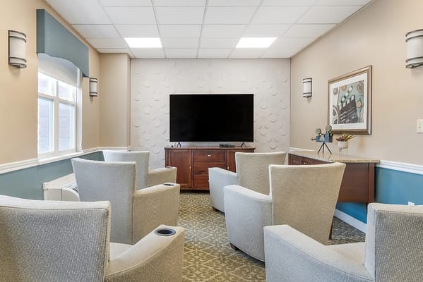 Common area with seating and a television