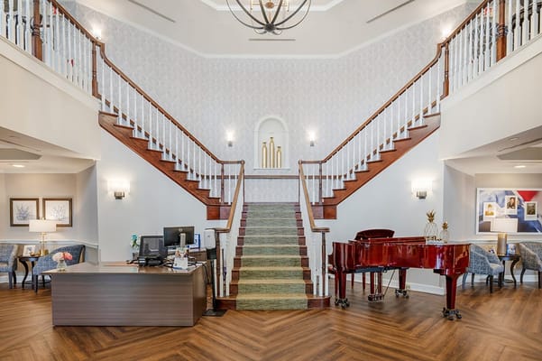 Interior view of a grand staircase and common area