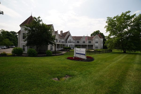Exterior view of Brookdale Kenwood facility with signage