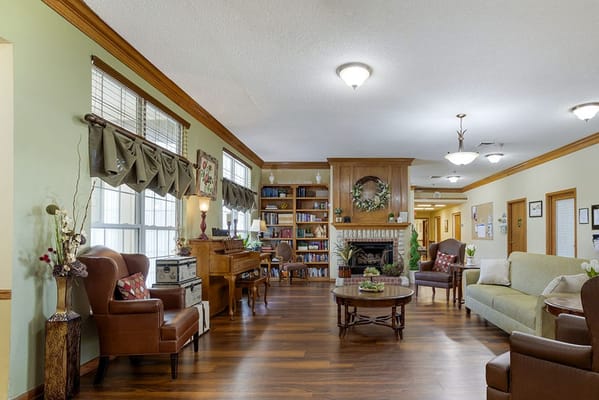 Interior common area with seating and bookshelves