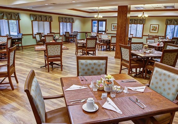 Dining room set up with tables and chairs