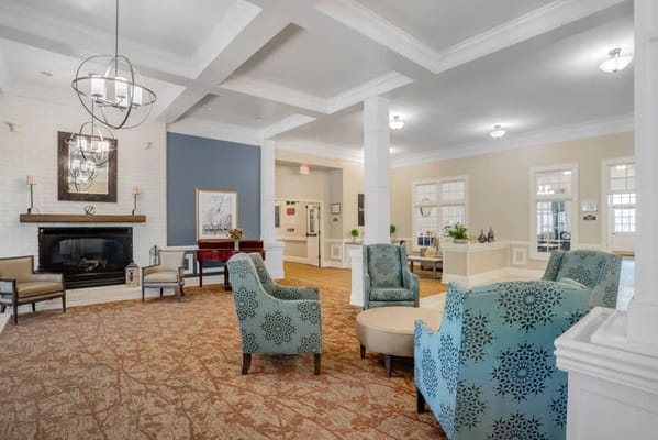 Interior of a common area with seating and fireplace