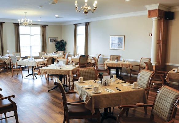 Dining room with neatly arranged tables and chairs
