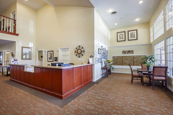 Bright and welcoming lobby area with reception desk