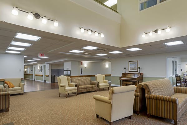 Interior common area with seating and piano