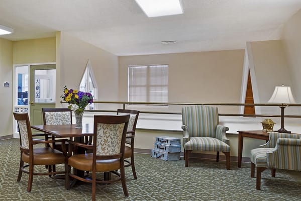 Bright interior common area with seating and decor