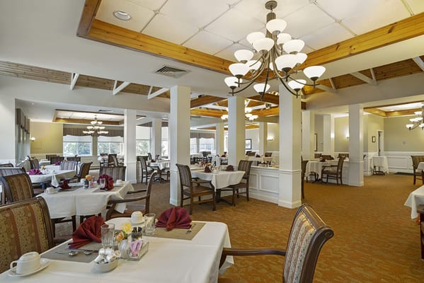 Dining area with tables set for a meal