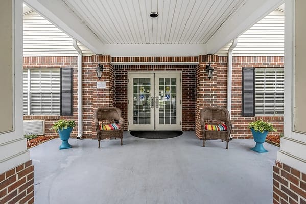 Entrance area with seating and planters