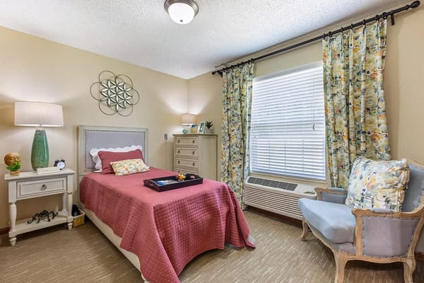 Cozy private resident room with a bed and decor