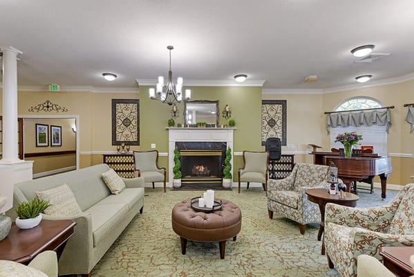 Common area with seating and a grand piano