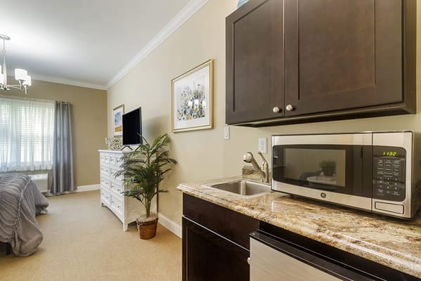 Cozy interior view of a resident's room with amenities