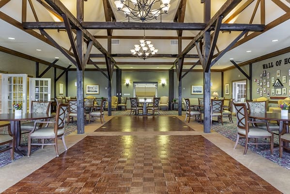 Interior common area with wooden beams and seating