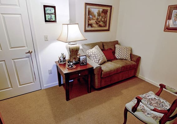Cozy living area in a resident's room