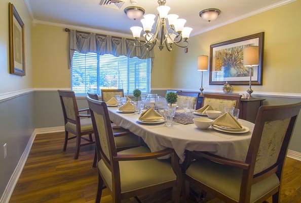 Dining room set up for a meal with elegant decor