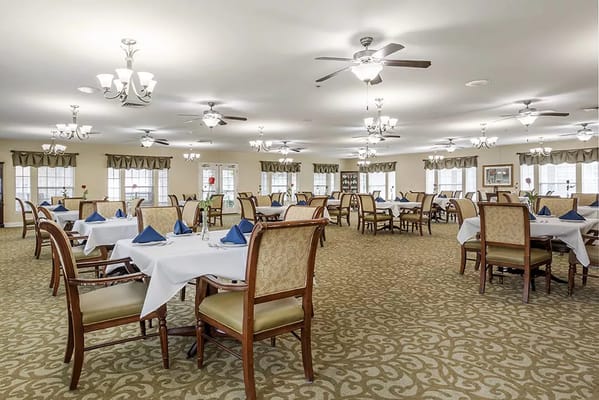 Dining room with tables set for a meal