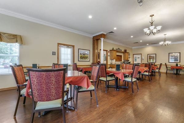 Interior dining area with tables and chairs