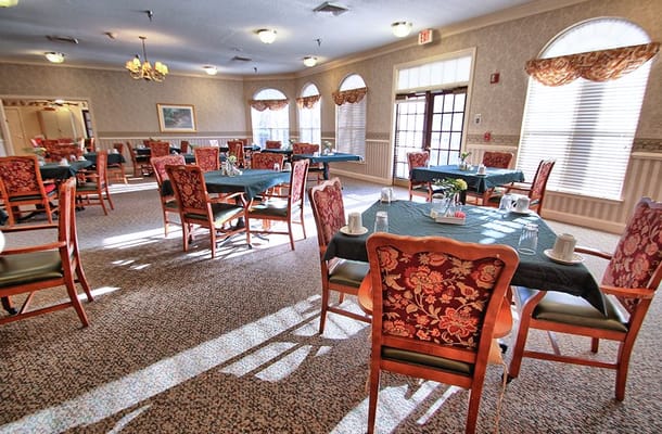 Bright dining room with decorated tables and chairs